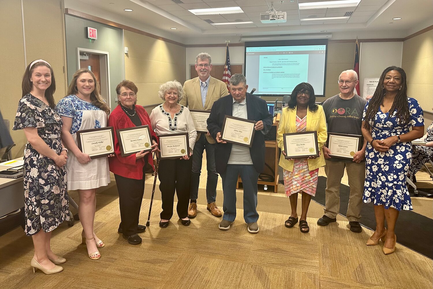 Chatham County volunteers were honored at the May Chatham Commissioners meeting by United Way. From left to right: United Way Executive Director Katie Childs, Connolly Walker, Rosemary Szydlek, Marylou Mackintosh, Michael Hobbs, Johnny Shaw, Mary Nettles, Bob Goetze and Chatham County Commissioner Chair Karen Howard.